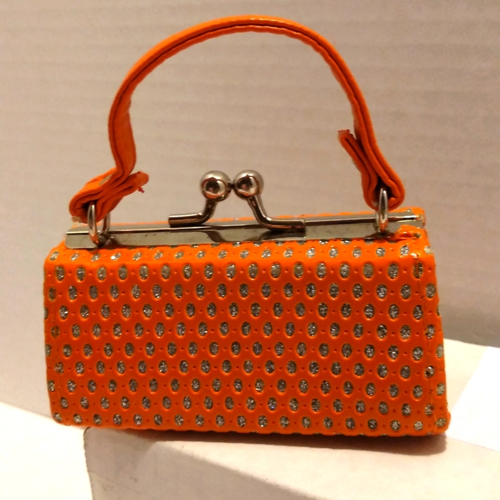 Miniature tick tock purse in Orange